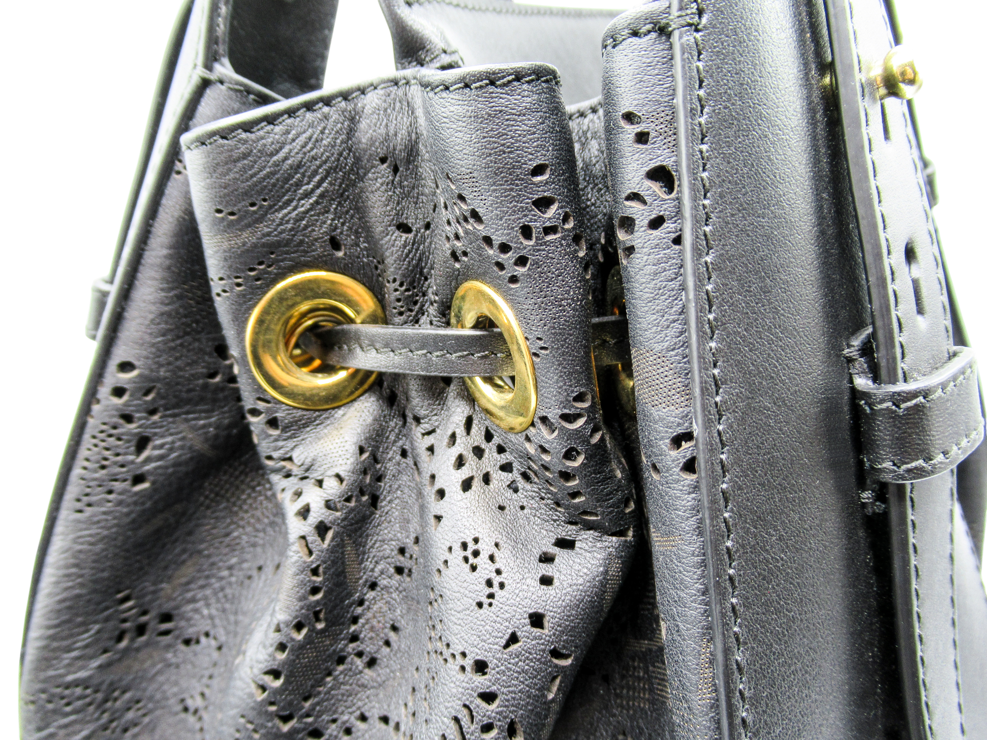 Borsa Eden in pelle con trafori laserati e logo di brillanti swarovski