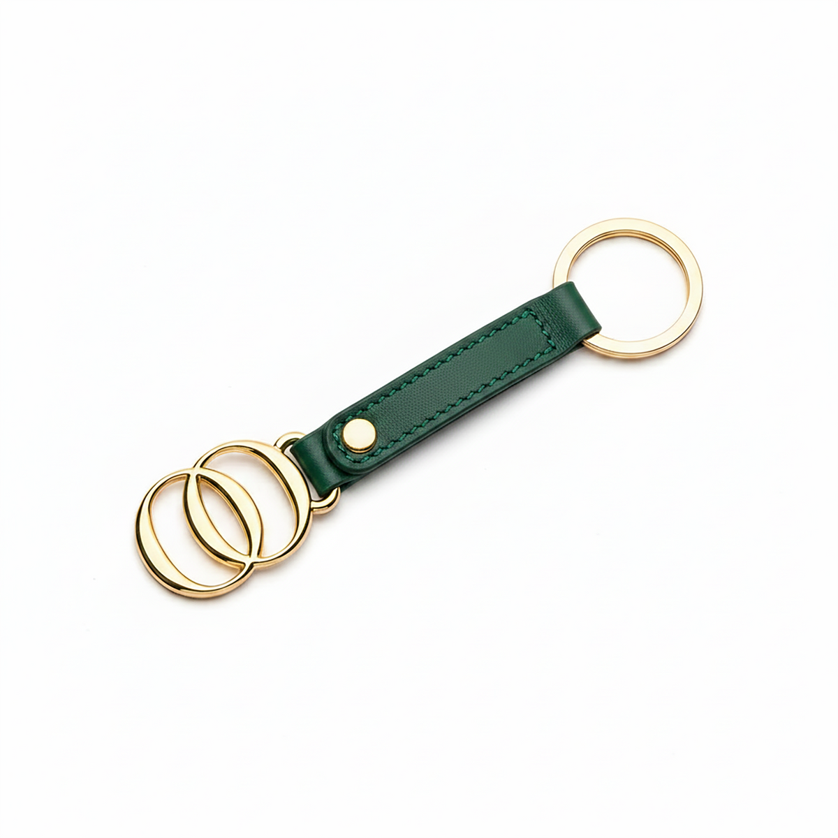 Portachiavi OROORO® in nappa color Pixie Green con finiture dorate su sfondo bianco