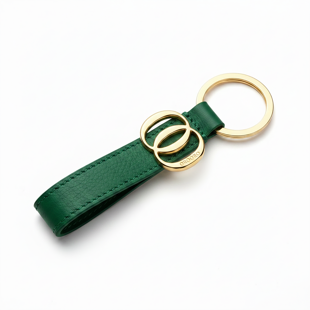 Portachiavi Charm OO OROORO® in nappa Pixie Green con charm e anello gold