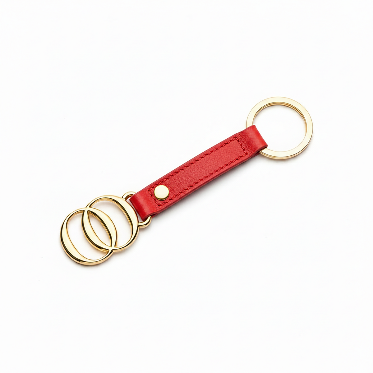 Portachiavi OROORO® in nappa color Santa Claus con finiture dorate su sfondo bianco